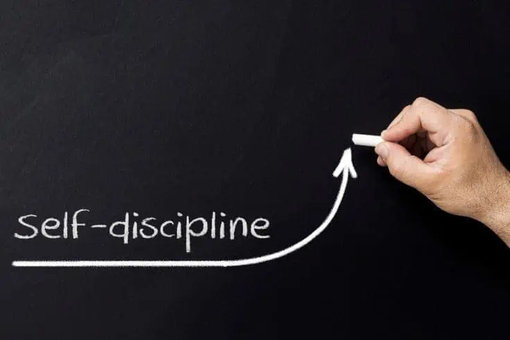 8 Steps To Financial Freedom 3 Financial Freedom. Self discipline written on a black board with a white chalk