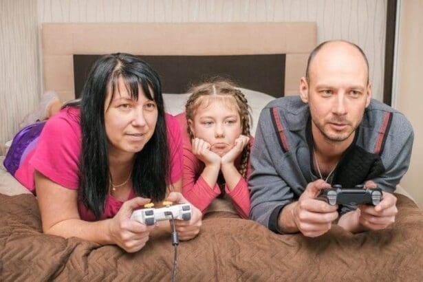 Parents playing video game and neglecting their child