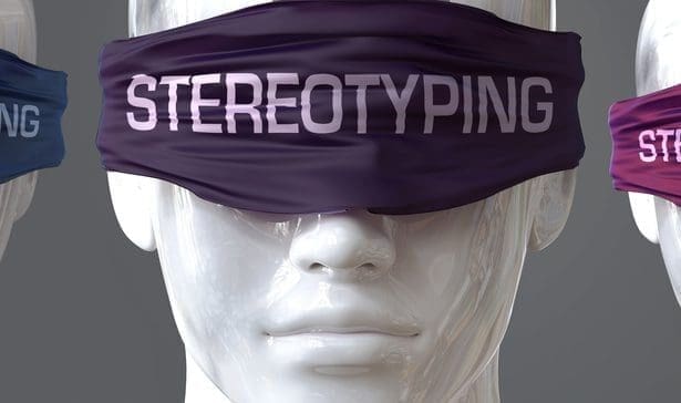 Mannequin's wearing blindfold with stereotyping written on it