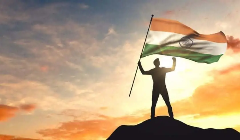Man holding the flag of India