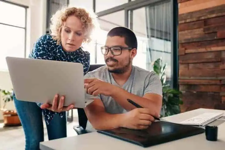 A young man helping out a female worker, Work Etiquette
