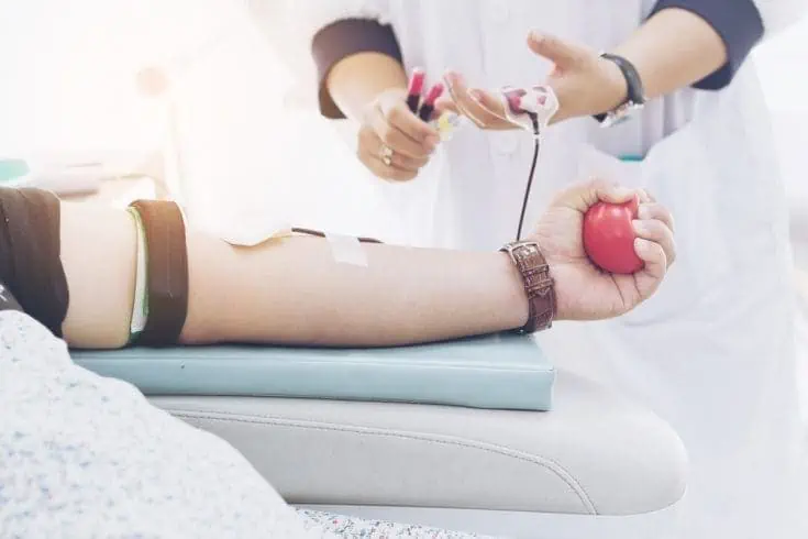 A person donating blood. 20 Things You Must Do Before You Die