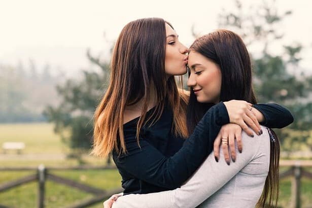 Sisters hugging eachother