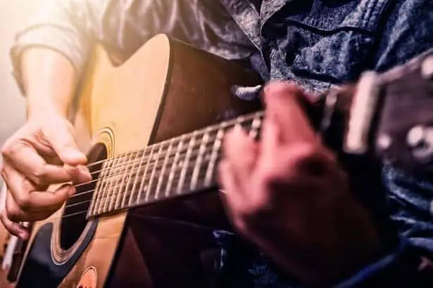 Woman playing guitar