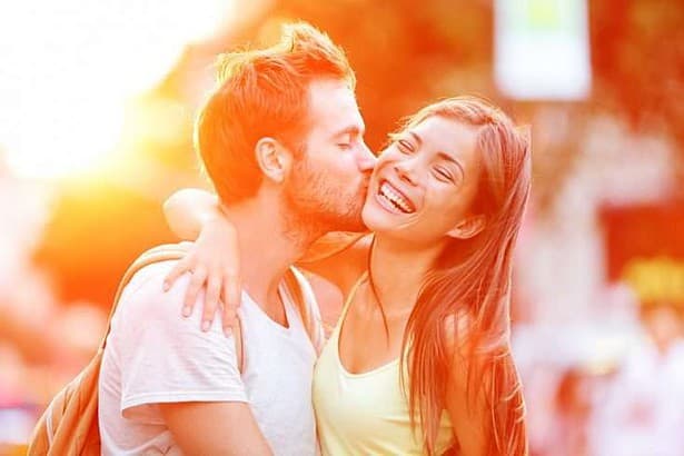 Two people in love laughing