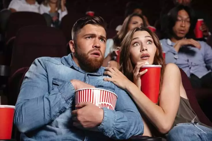 Couple watching horror movie
