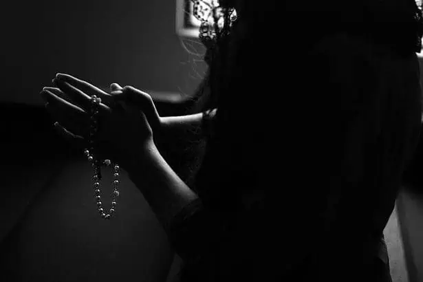 religiously praying