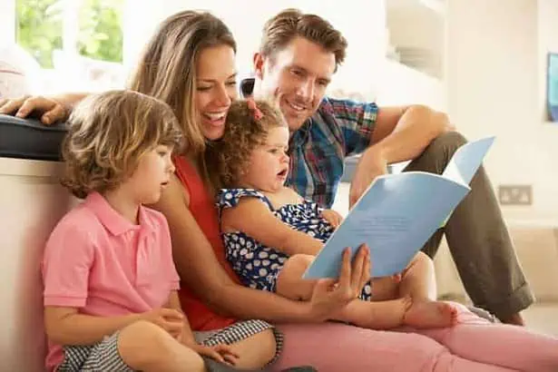 Parents sitting down with their children