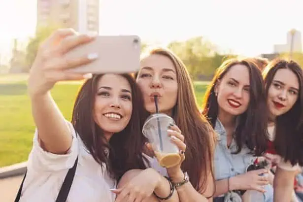 Friends having fun and taking a selfie
