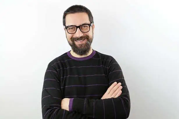 Man wearing a striped black shirt. men will be men