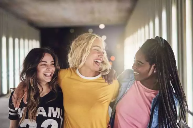 College friends laughing together