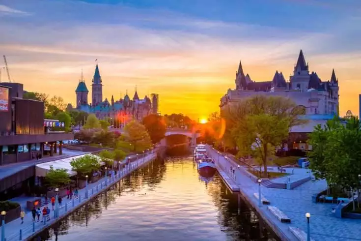Smart Cities - The Nation's Urban Future 2 Smart cities. View of Ottawa city buildings and Rideau canal from Mackenzie King bridge during sunset