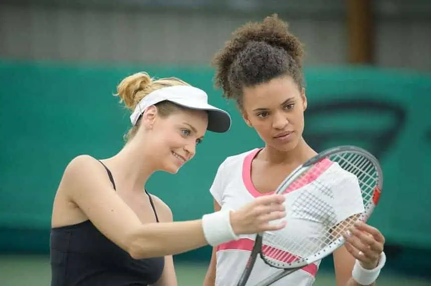 The Diet of a Superstar Tennis Player 1 tennis player checking her friends racket.