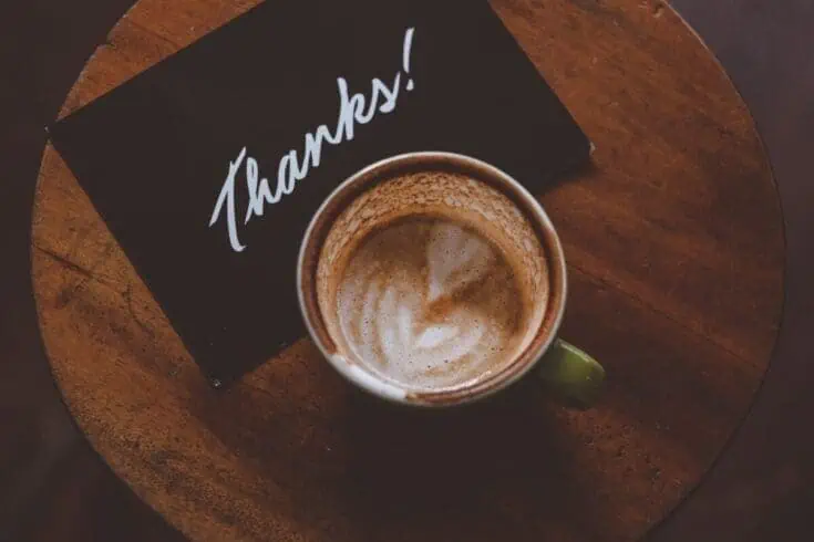 Cup of coffee with thanks written above