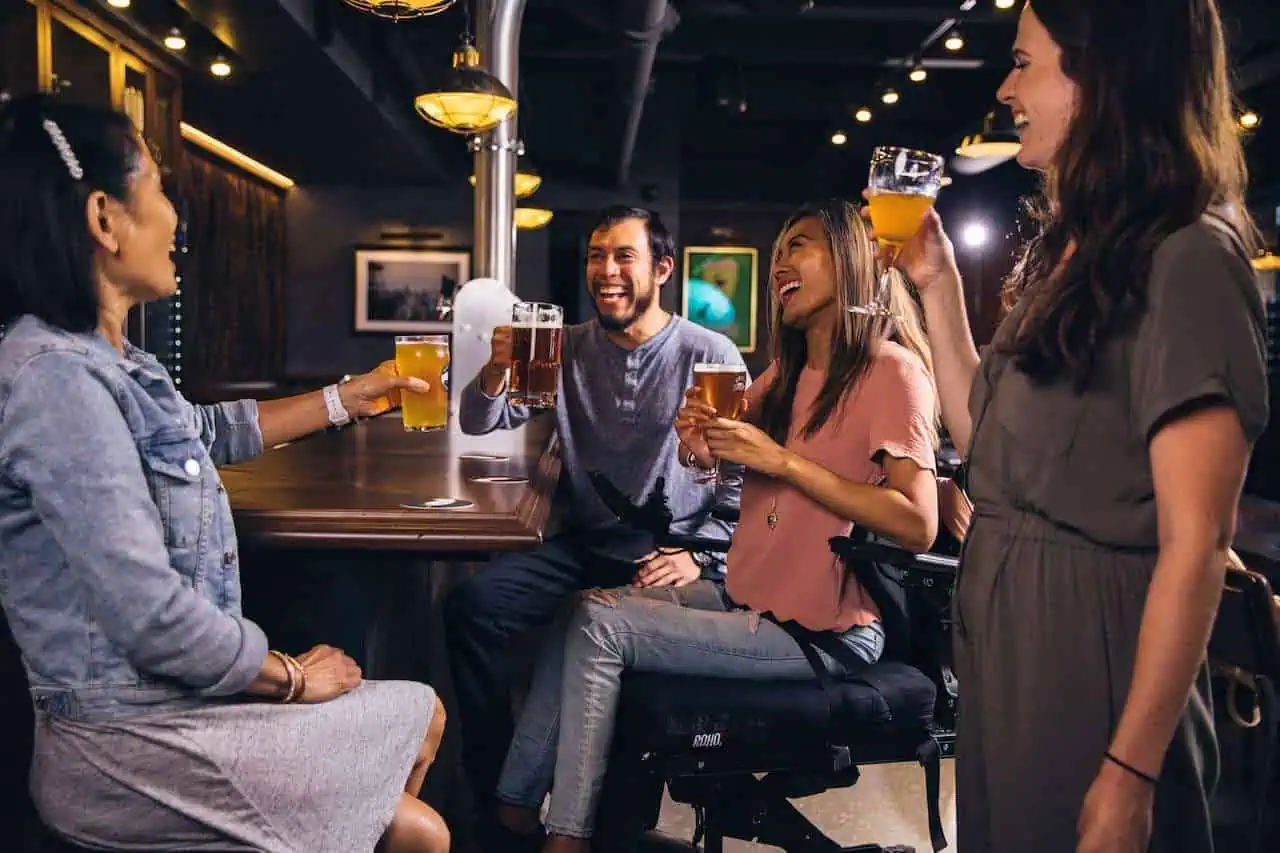 How to Be Witty and Charming- 18 Simple Tips 2 Group of people having a fun conversation