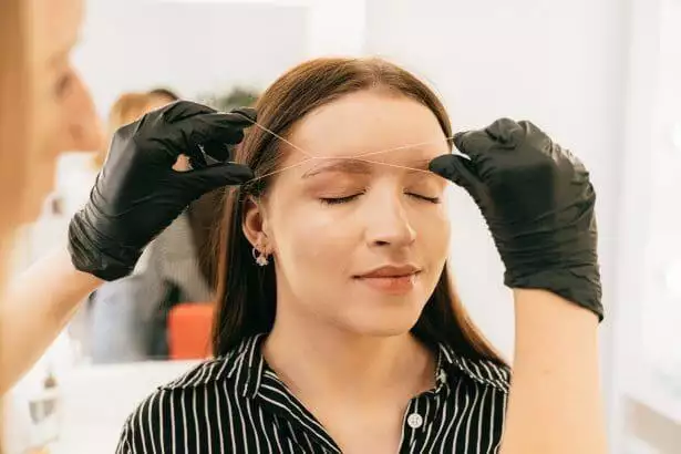 What is eyebrow threading?