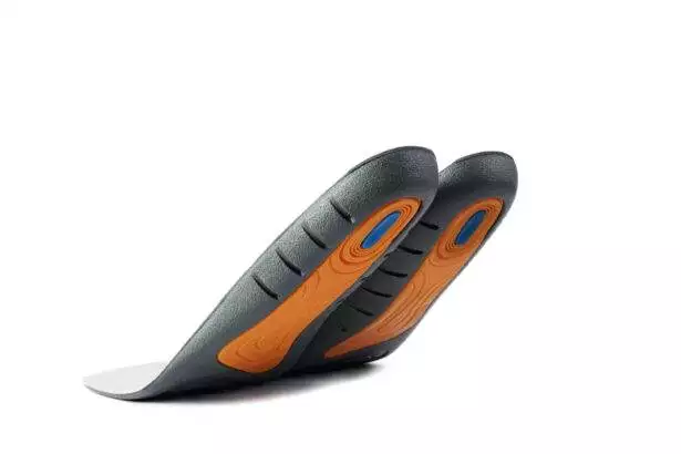 Insoles isolated on a white background. Soft foam insoles with silicone inserts bottom view.