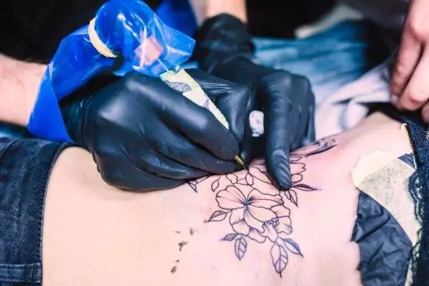 Tattoos.