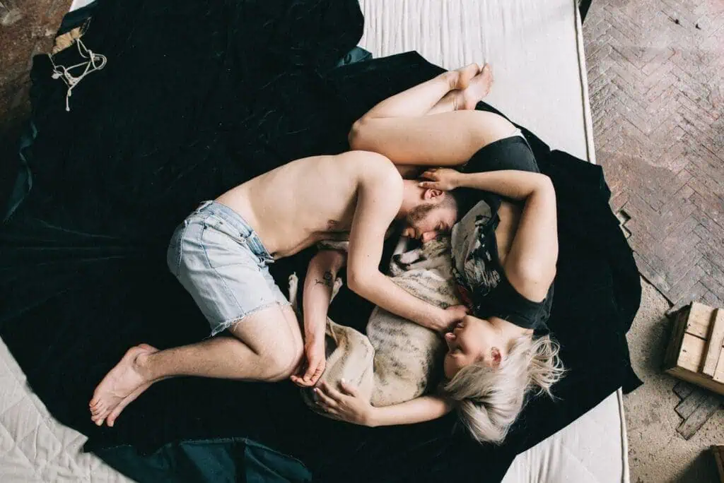How To Write A Condolence Message: 120+ Examples 4 A couple laying with their pet