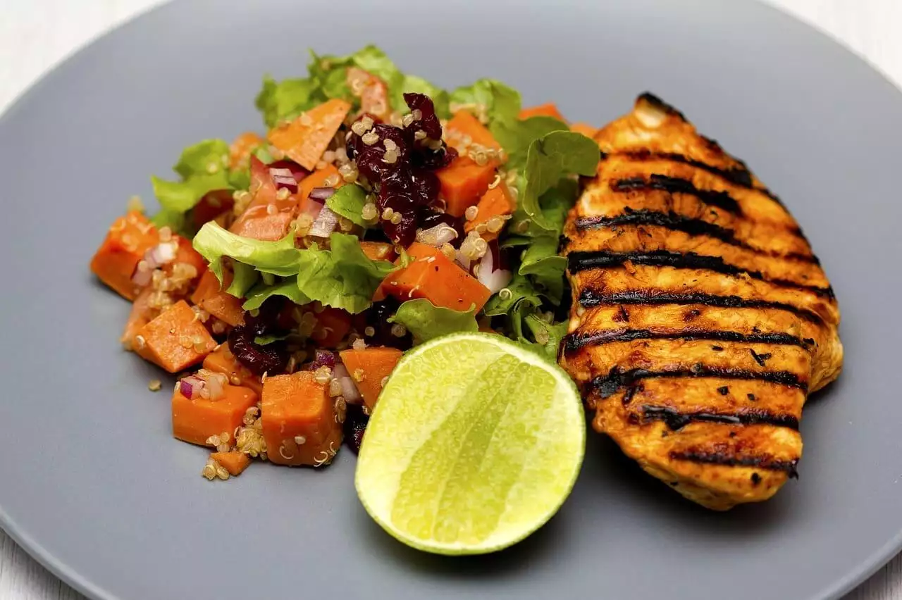 Grilled chicken, Quinoa, Salad image.