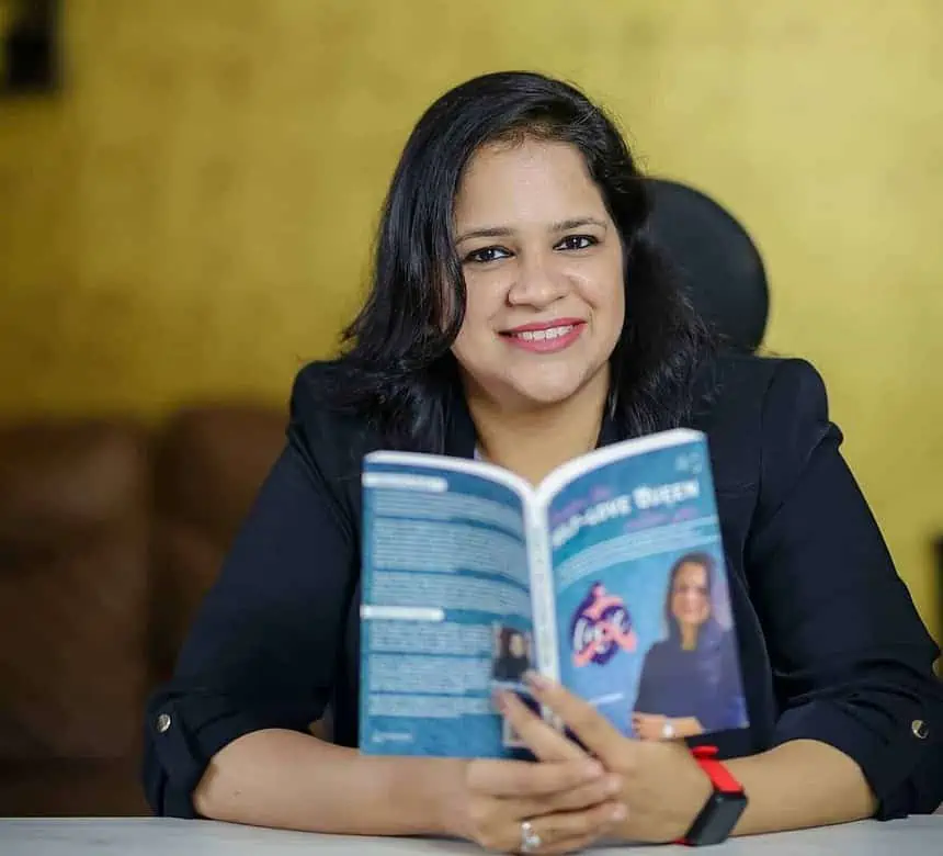 Priyanka Verma holding her book 