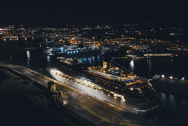 aerial view of city scale with cruise ship