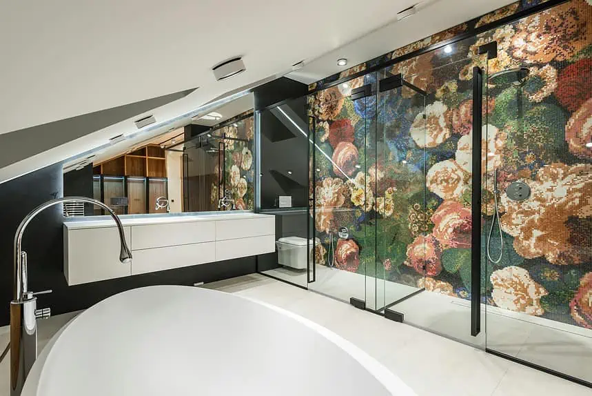 Master the Art of Building a Bathroom Vanity with These 4 Key Points 1 Elegant bathroom featuring a glass shower enclosure and a floral mural wall.