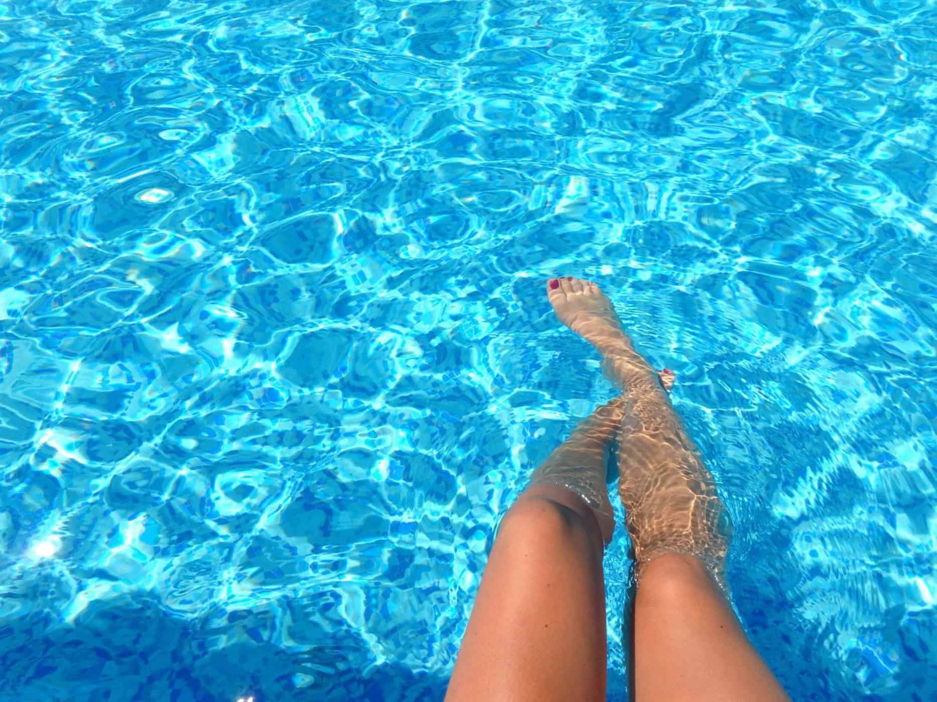 Home Icy 45 Picture of woman's legs in swimming pool