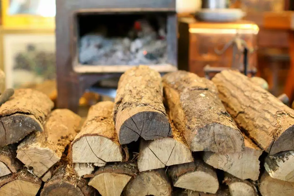 Building Warmth: A Step-by-Step Manual to Constructing Your Own Chimney 3 Stack of firewood