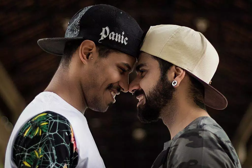 Deciphering Spectrum: A Guide To Understanding A Guy's True Sexuality 3 Two gay people looking at each other