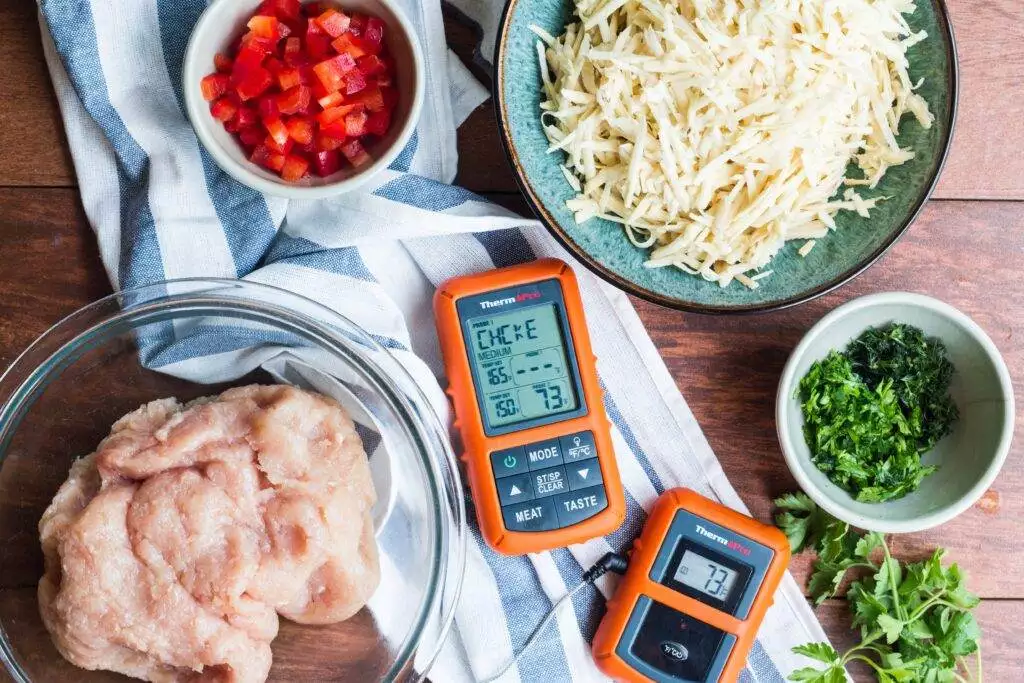 meat thermometer kept along with food ingredients