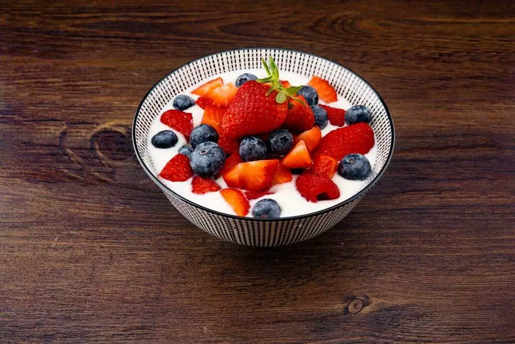 greek yoghurt with fruits in a bowl