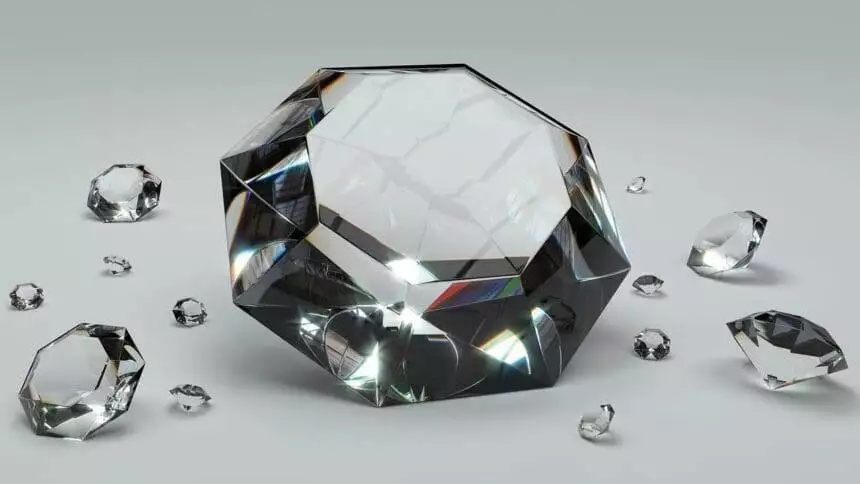 Gemstone Evolution: The Growing Popularity of Lab-Grown Diamonds 1 A close-up of shiny diamonds on a plain surface.