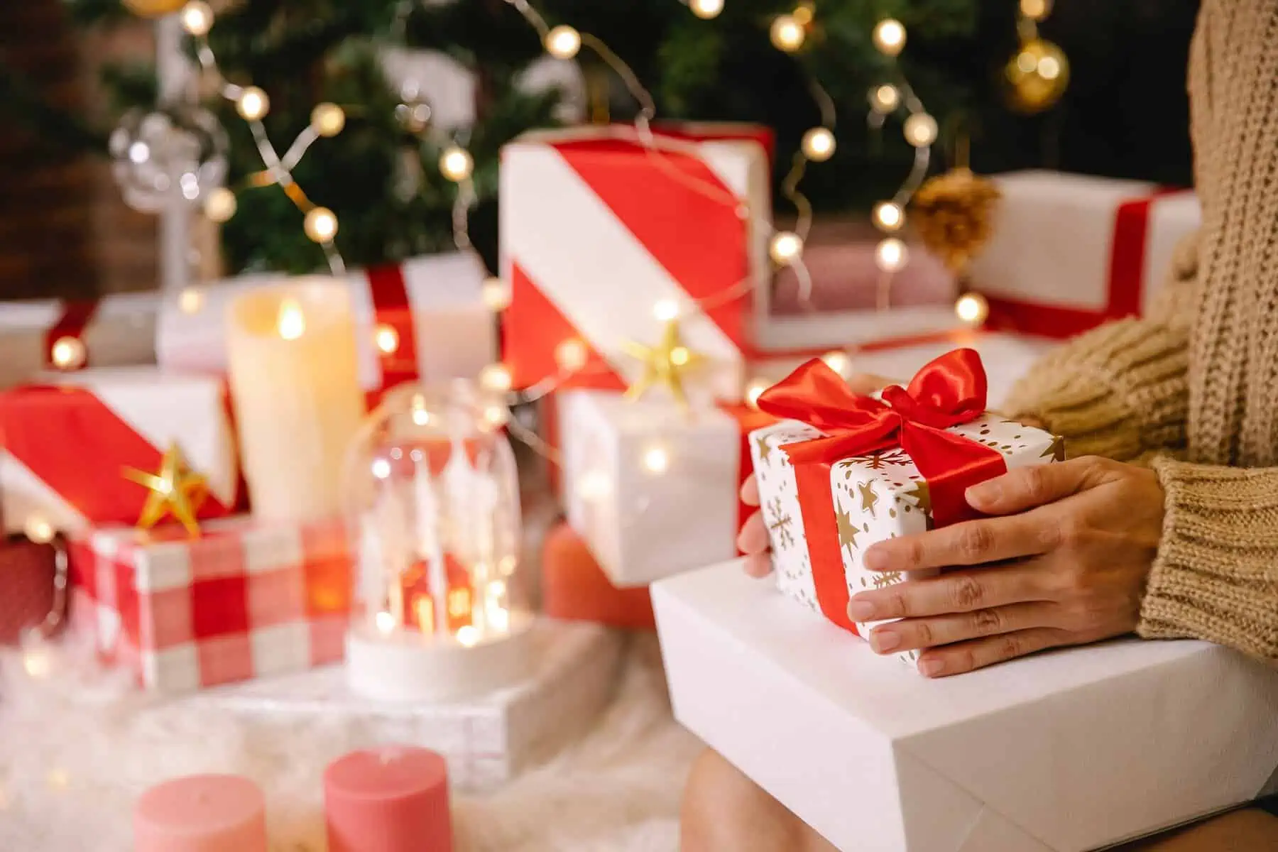 Gifts beside a christmas tree
