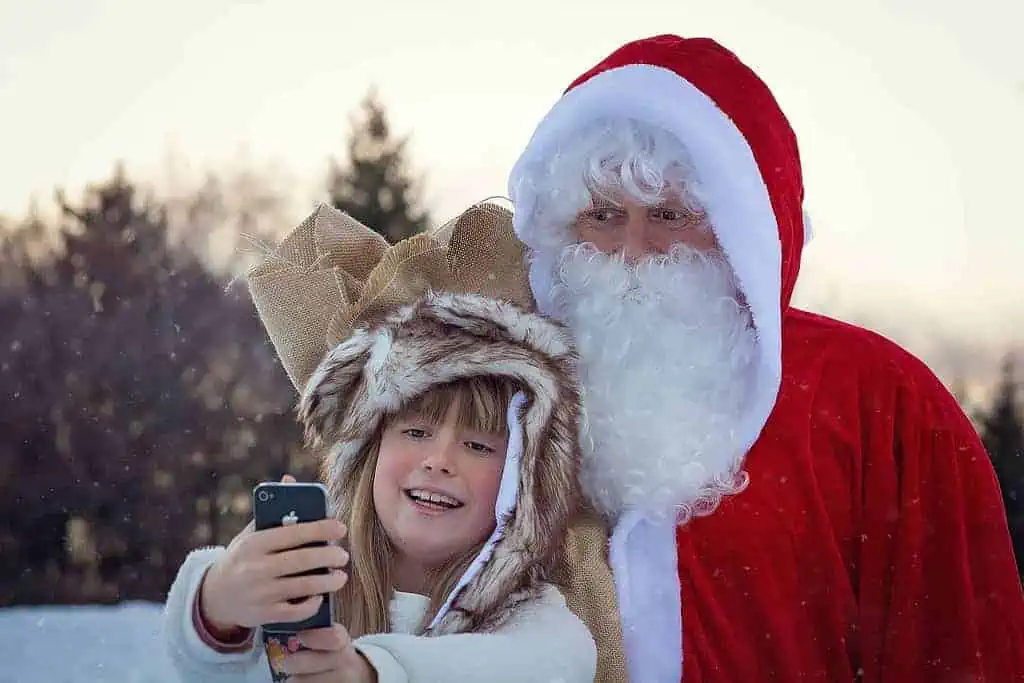 A child with Santa claus
