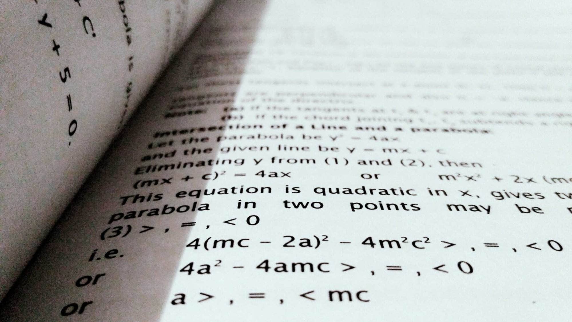 Close-up of calculus equations in textbook.