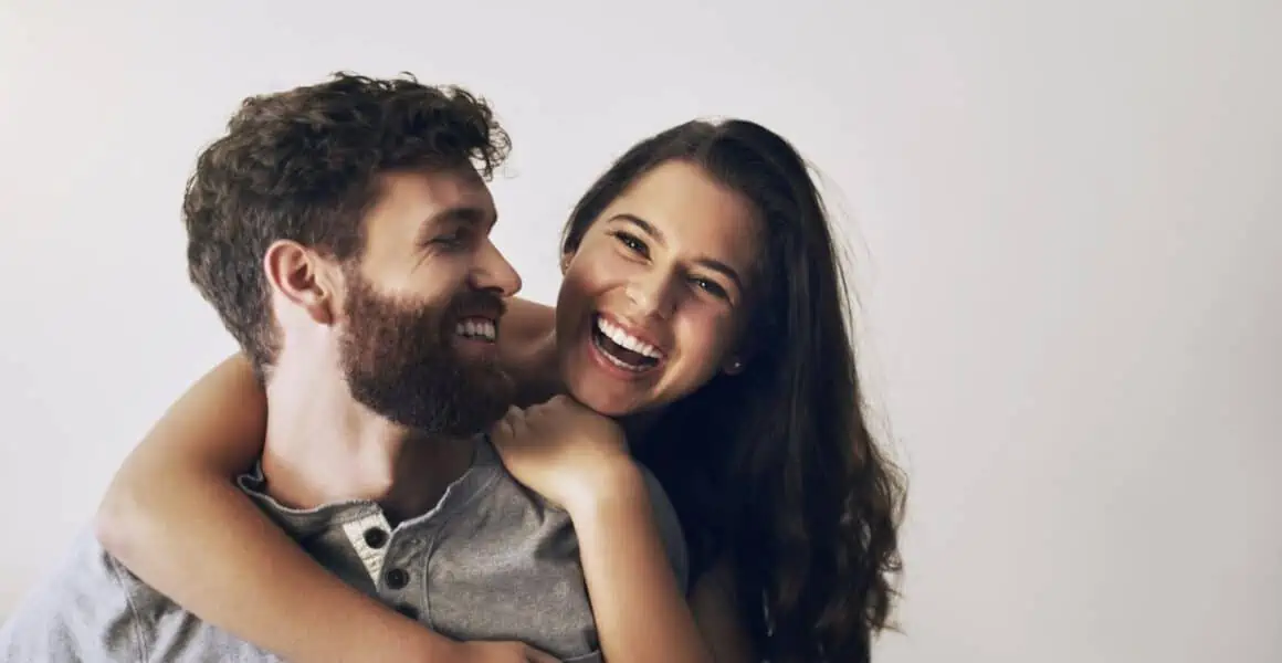Shot of an affectionate young couple sharing a romantic moment in the bedroom at home