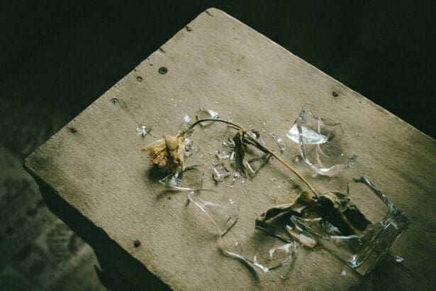 Shattered glass on a concrete surface.