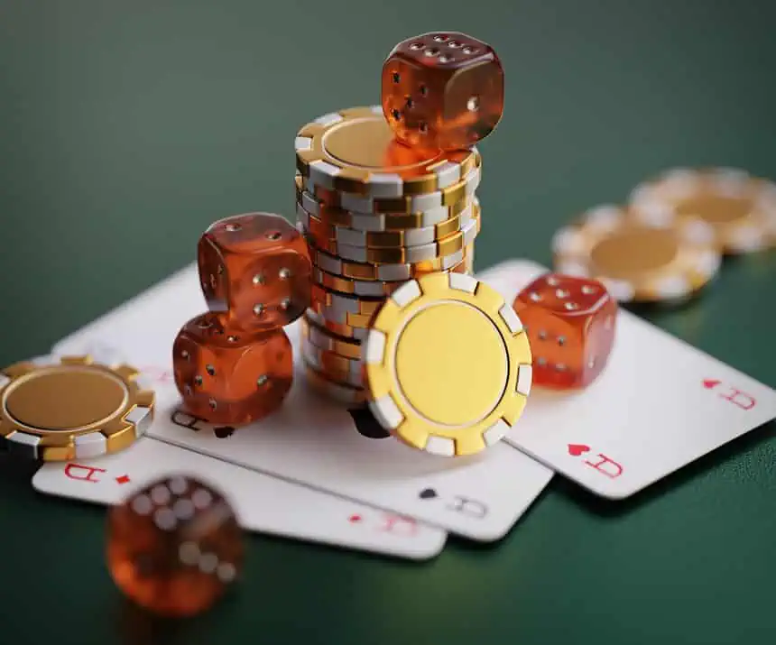 Casino dice, chips, and cards on green felt table.