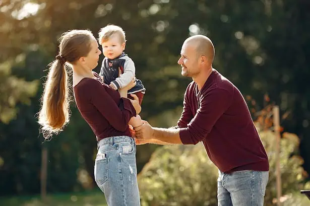 Family enjoying outdoor time in a park.