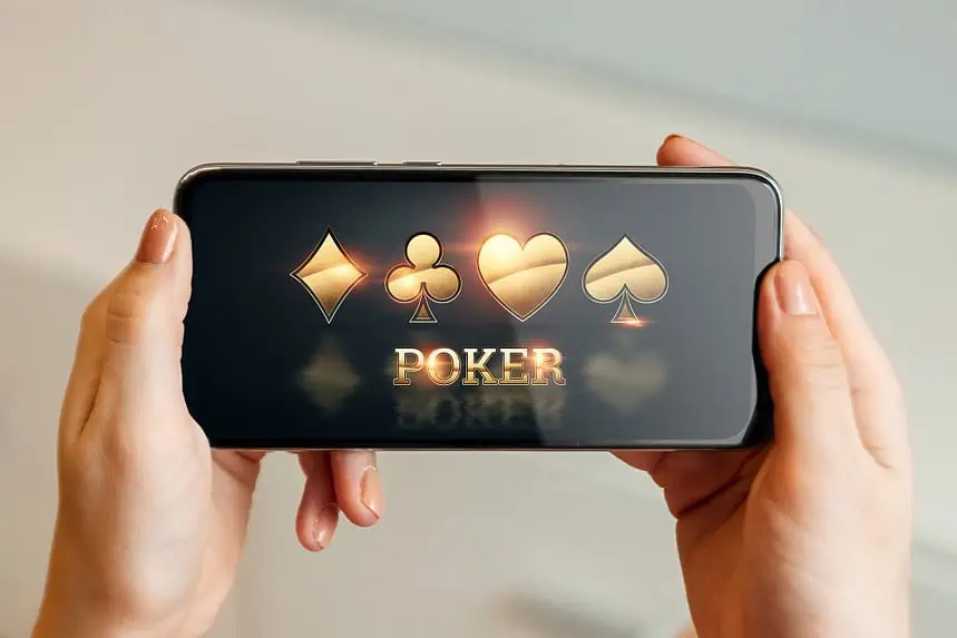 Lock Down Your Loot: How to Keep Your Info Safe While Gaming Online 1 Person playing mobile poker game online.