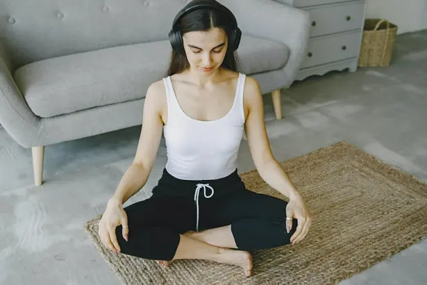Woman in peaceful meditation at home
