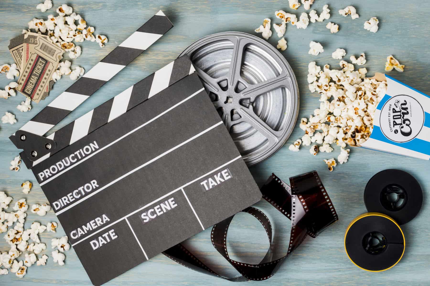 Home Icy 46 Film production clapperboard with reel, popcorn, and camera for movie making.