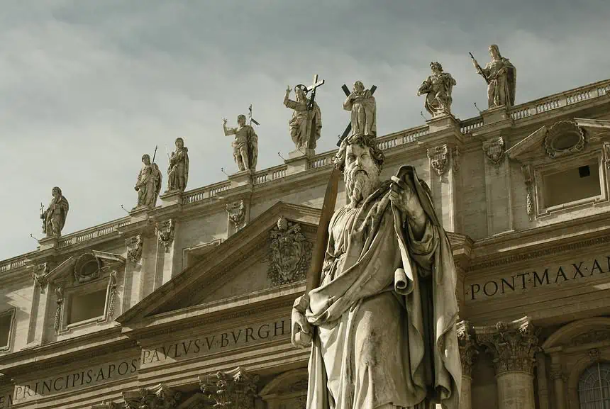 Ancient statues and architecture of St. Peter's Basilica in Vatican City.