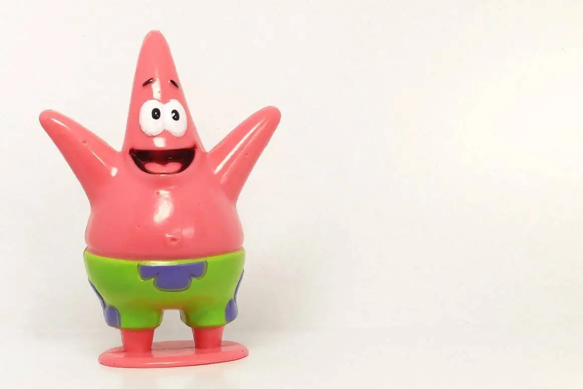 Patrick Star figurine, a popular character from SpongeBob SquarePants, with a cheerful expression an.