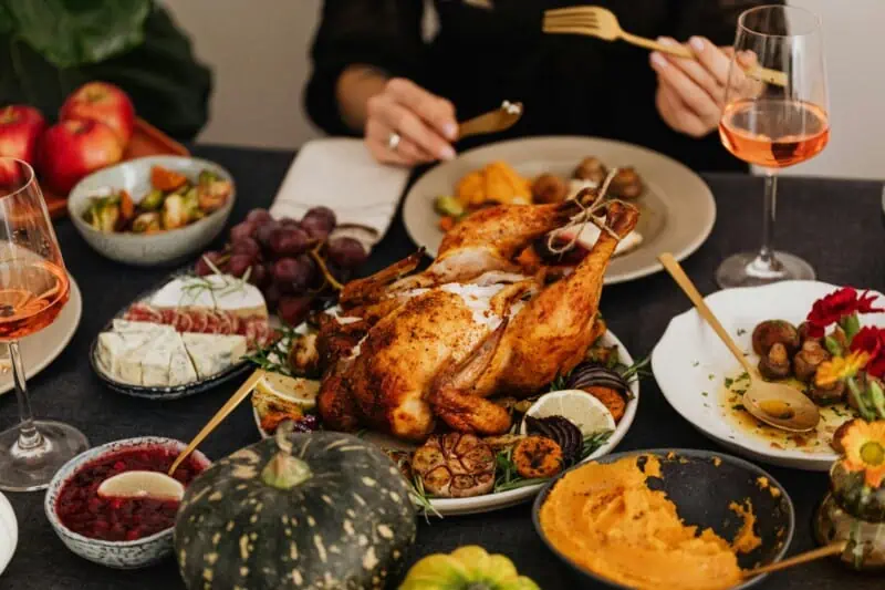cooked turkey dish surrounded by other dishes