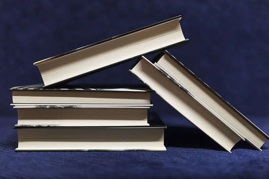 The World of Rare Books: Find the Top 7 Rarest First Editions 1 Stack of five books arranged on a dark background.