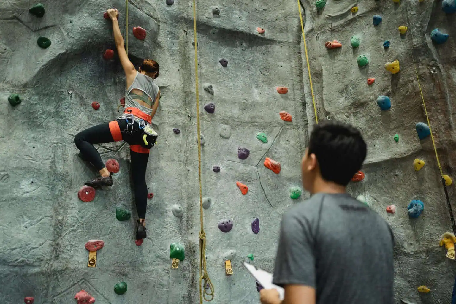 Indoor rock climbing activity for adventure enthusiasts.