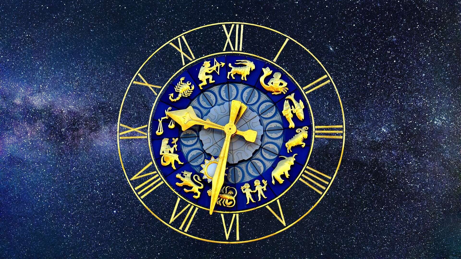 Detailed image of zodiac sign clock with zodiac symbols on deep space star background.