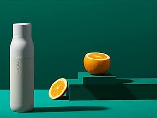 High-quality water bottle with orange slices for a refreshing look.